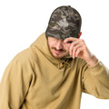 Men’s olive camouflage trucker hat with Urban Minaret logo front view